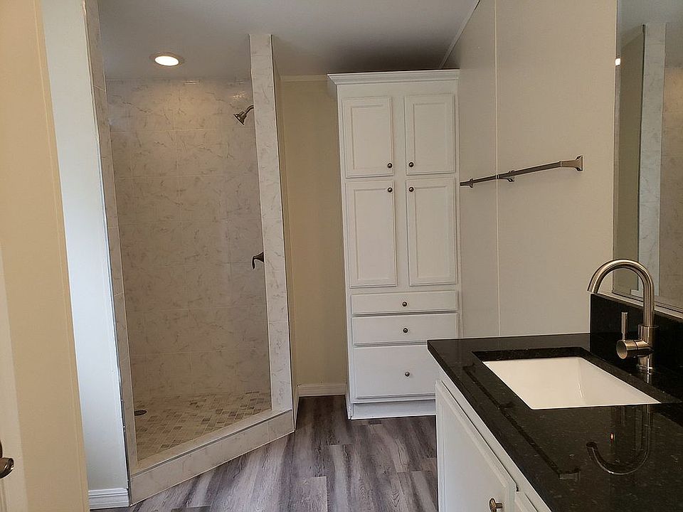 Walk in shower and granite