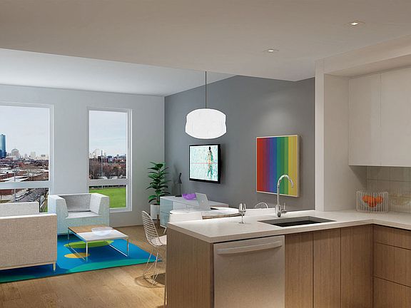 The Melnea features open floor plans, large windows and skyline views of Boston