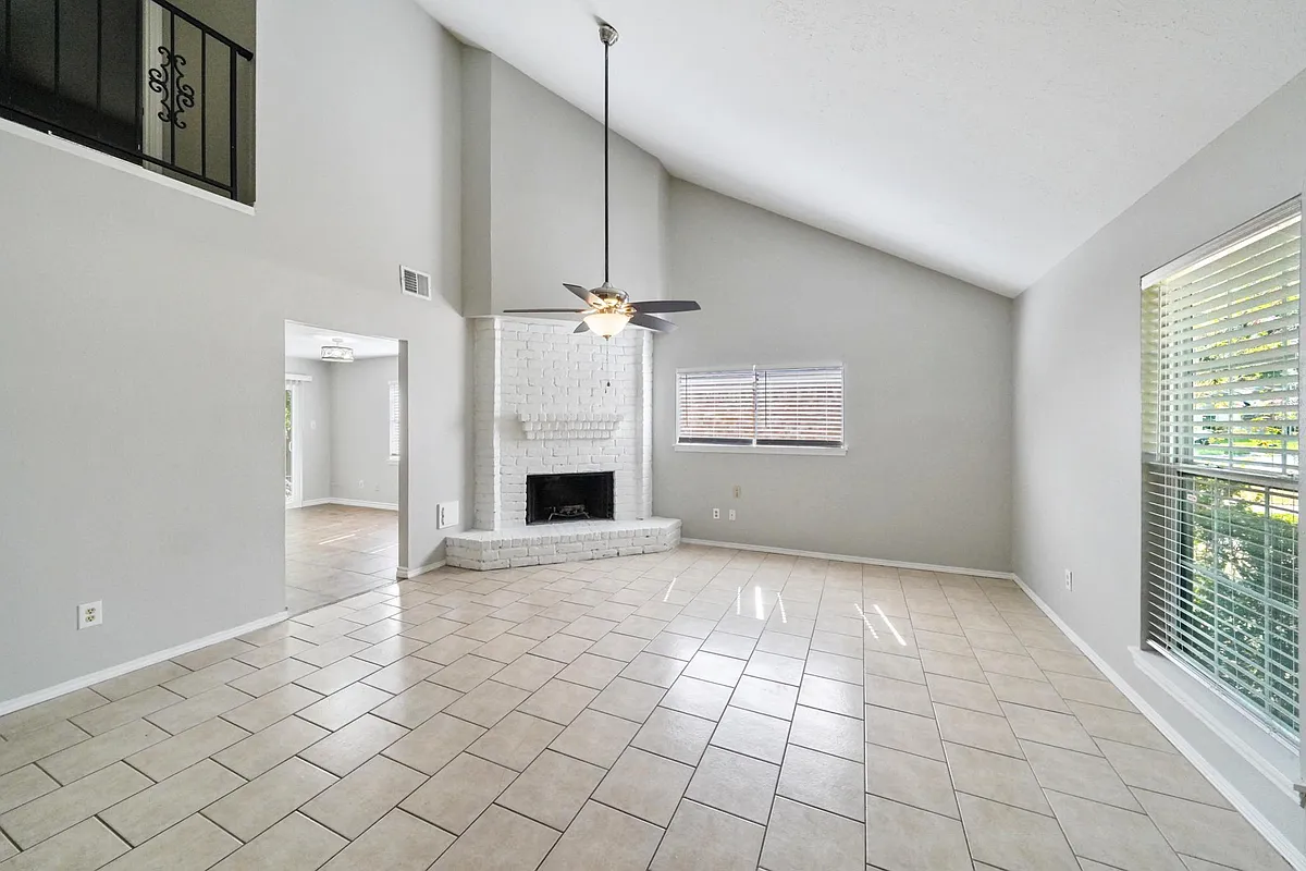 living room with fireplace - 28630 Lochlevan Ct