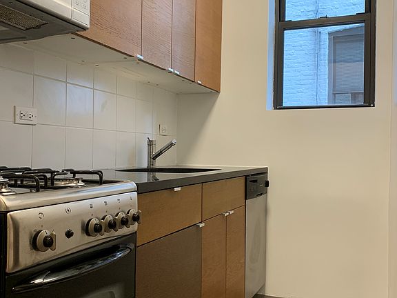 3rd image of 214 E 11th St APT 2C