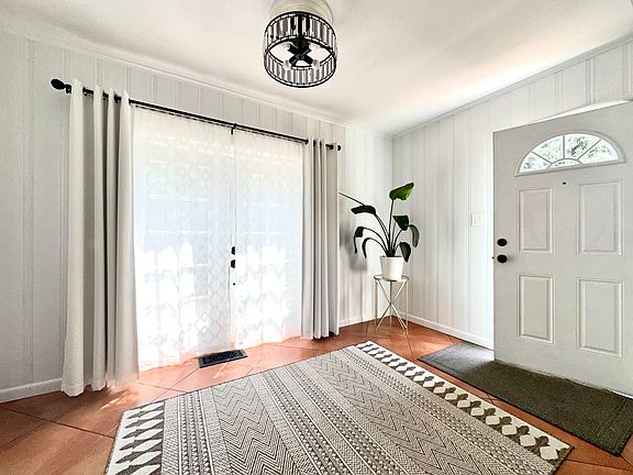 main entry with french door access to patio