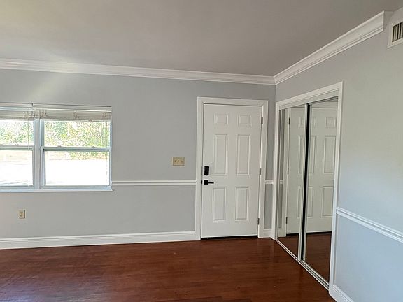 Front door and coat closet