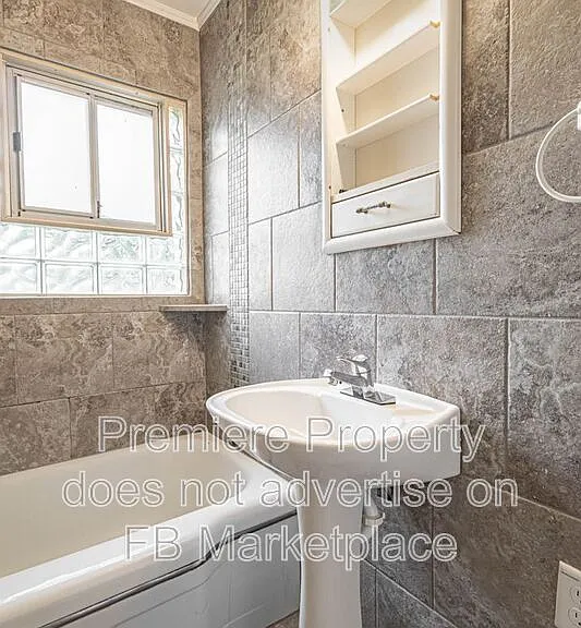1107 W 27th St S — Photo 10