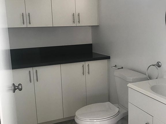 1st story 1/2 bathroom with storage
