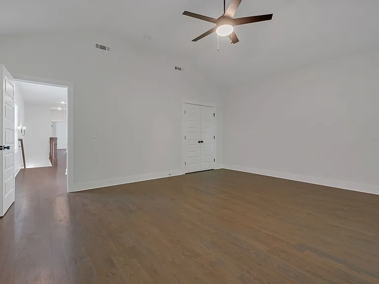 Bedroom #2 (or bonus room) - looking out towards stairs.