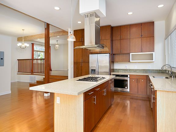 kitchen with large counter space and modern stove