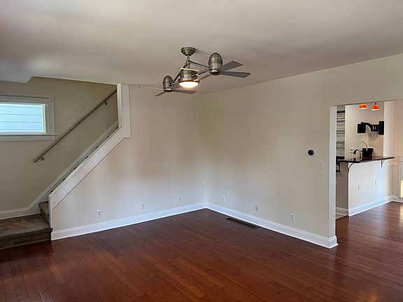Living Room - 2 - stairs and view onto DR and Kitchen
