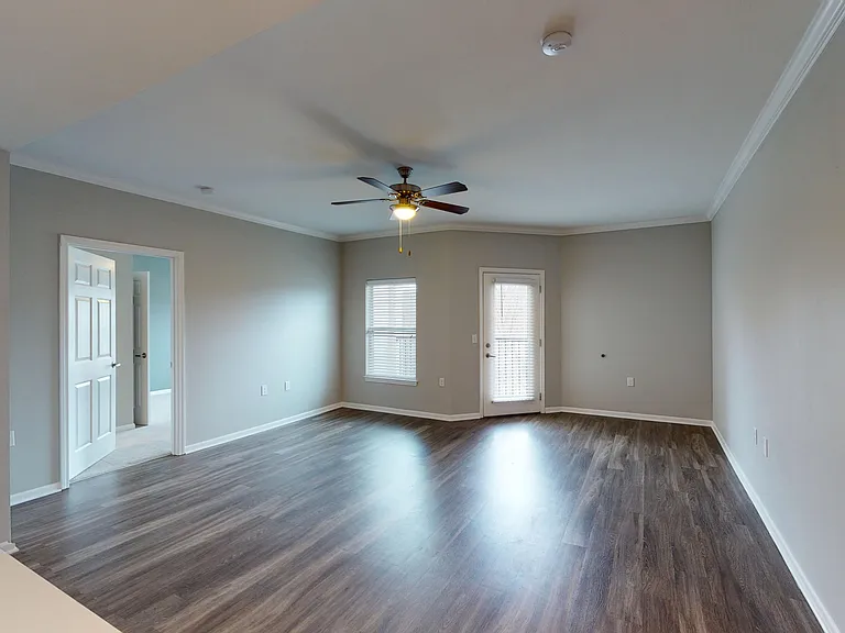 The Hickory floor plan includes a large living room off of the kitchen, including access to a private patio or balcony. The Hickory floor plan includes a large living room off of the kitchen, including access to a private patio or balcony.