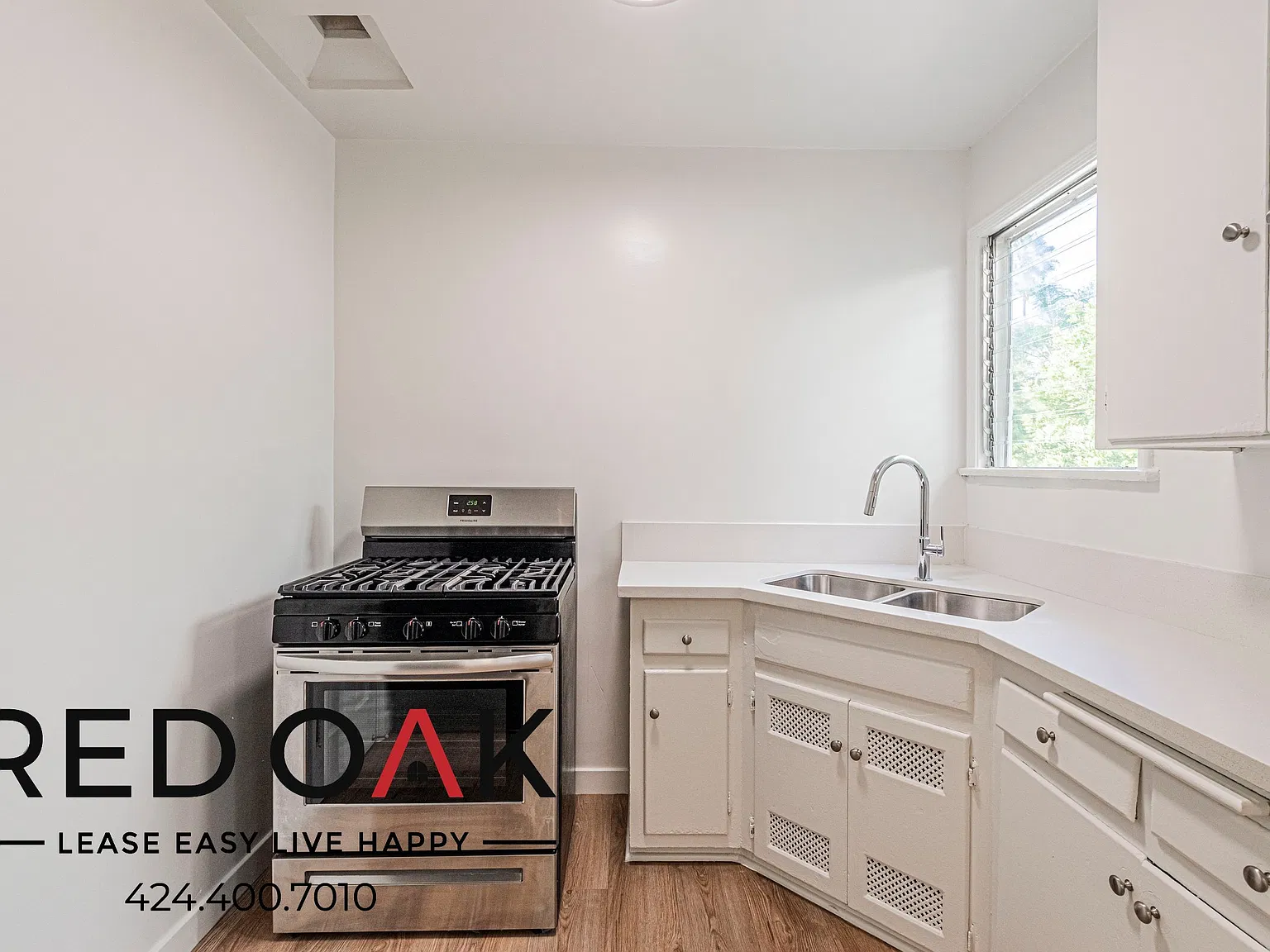 Sunlit 2-Bed with Stainless Steel Appliances, Central AC, Patio and Parking Included in the Heart... — Photo 2
