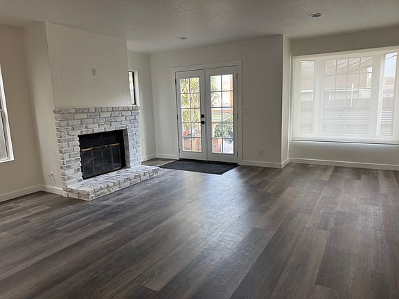 Living room with patio door to front yard
