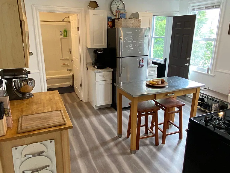 Kitchen - Facing back wall cabinets and bathroom