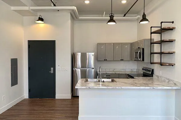 Kitchens with high ceilings and plenty of storage.