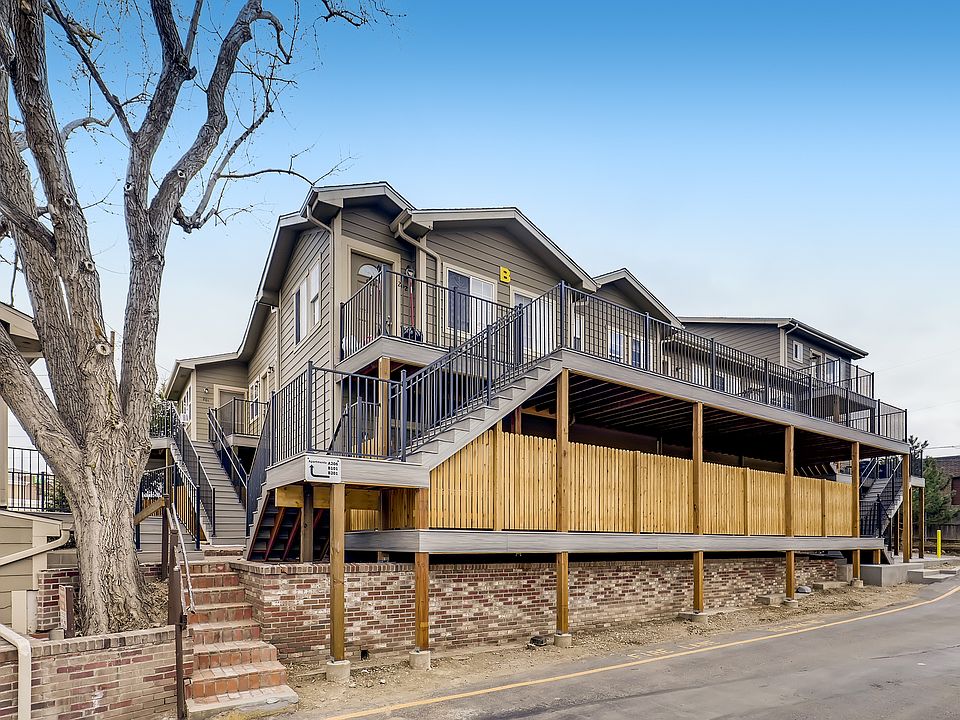 Explore contemporary living in this beautifully structured two-story apartment with inviting outdoor spaces.