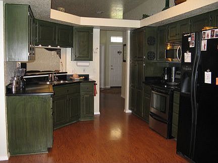 Kitchen w/ new solid surface countertops, stainless appliances