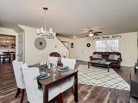 This home is ready to accommodate any sized family inside & out!