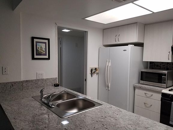 Nice frig & new sink with granite counter