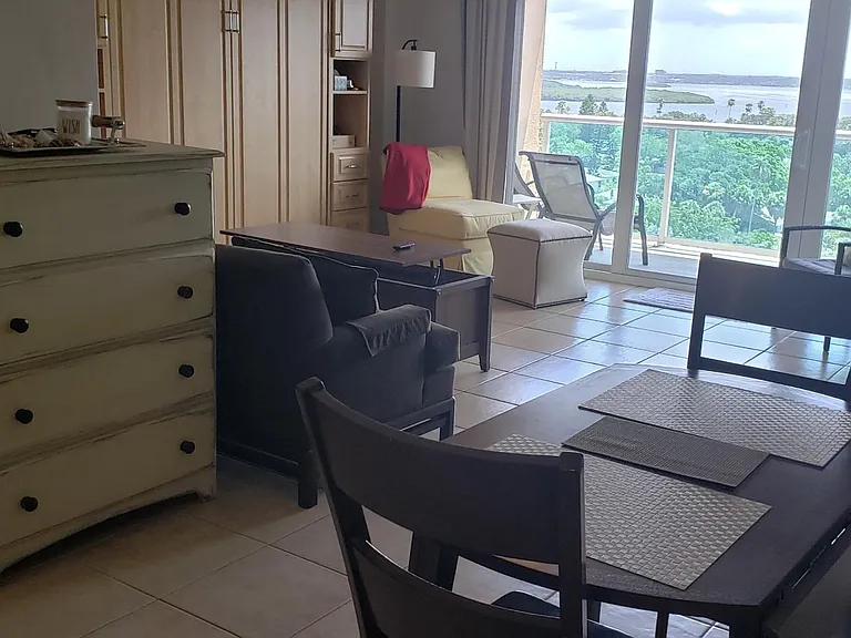 Entry view - full kitchen to left minus a dishwasher and full bath with tub to the right along with double closet.