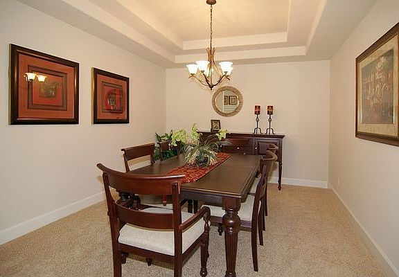 Formal dining room with coffered ceiling