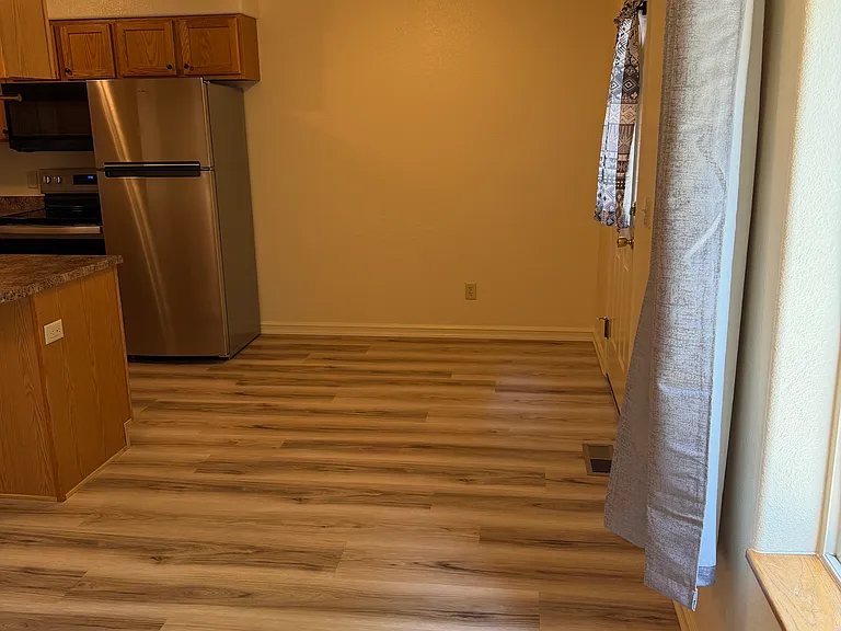 Dining room with door to back yard.