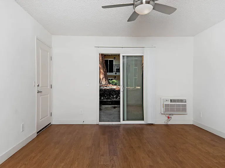Living Room with Hard Surface Flooring and Balcony