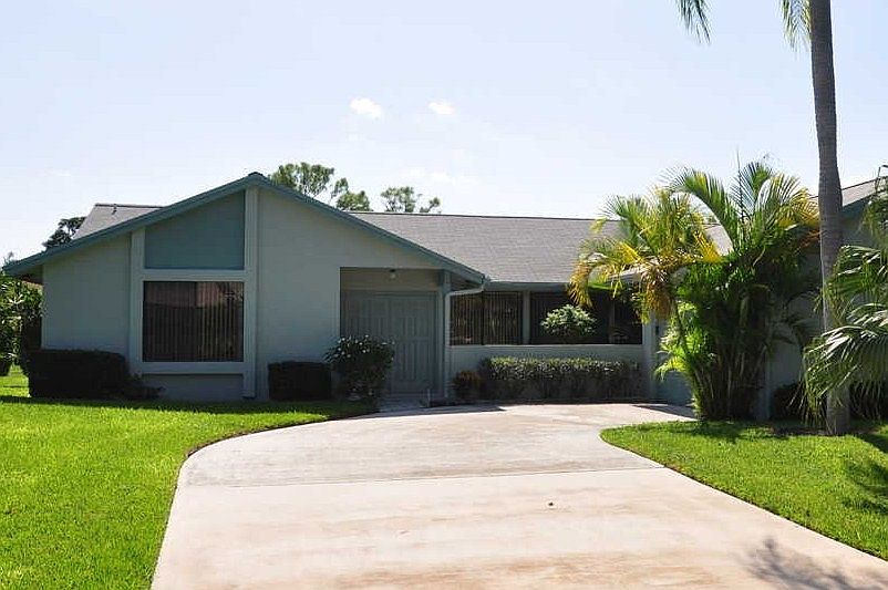 3010 NW 13th Court in Rainberry Bay - A Country Club Style Community