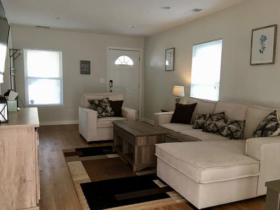 Spacious and sunny living room for relaxing at home.