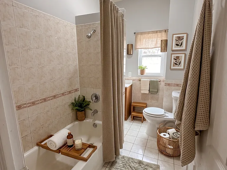 Bathroom- This room has been virtually staged using AI to help visualize its layout and design potential.