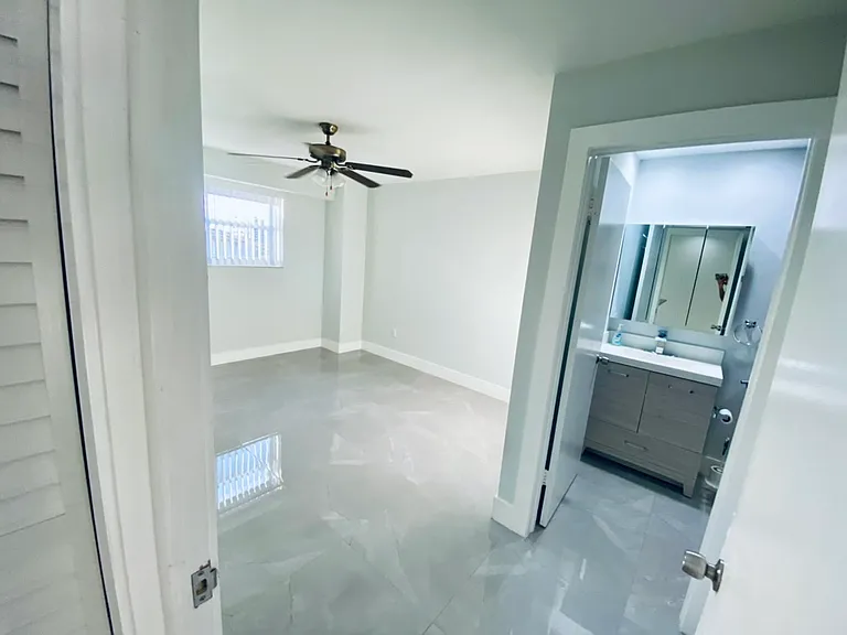 Master bedroom with walk in closet and en suite bathoom