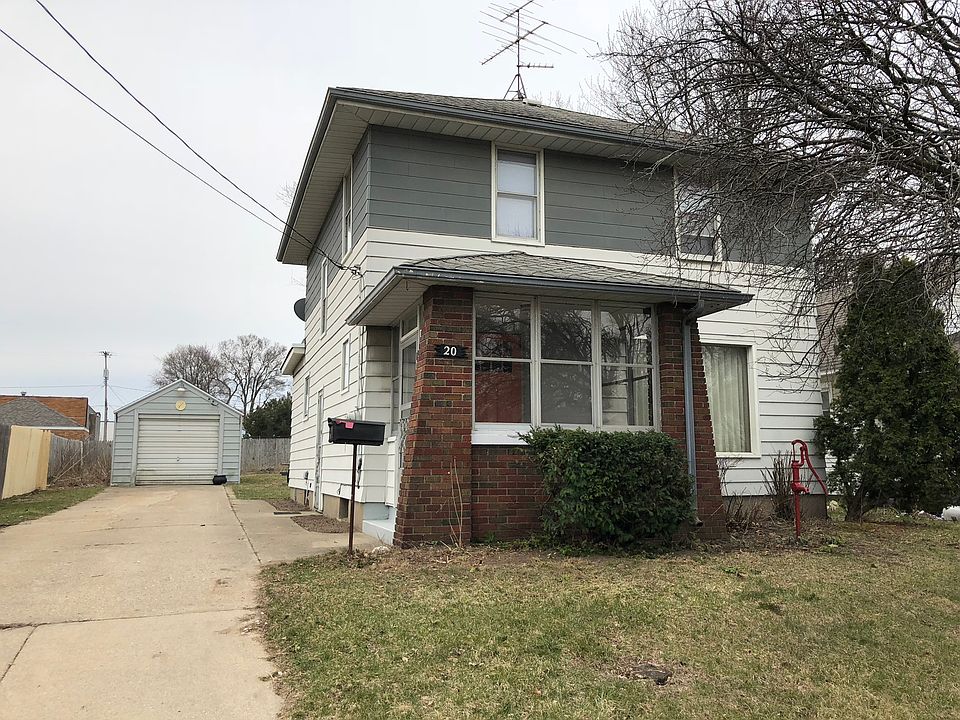 Front of house & garage