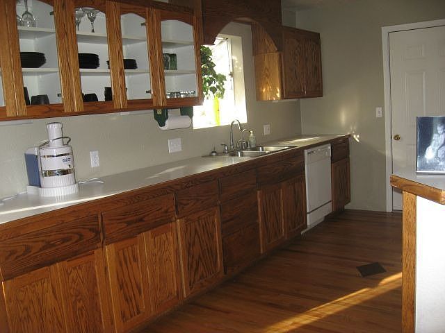 Custom made oak cabinets with oak flooring