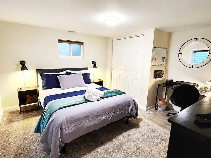 Large furnished bedroom with private workspace _ travel nurse and corporate housing in Aurora CO