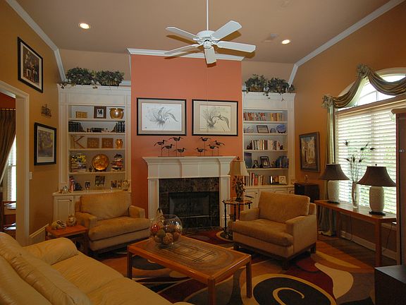 Fabulous living room with high ceilings and large windows!