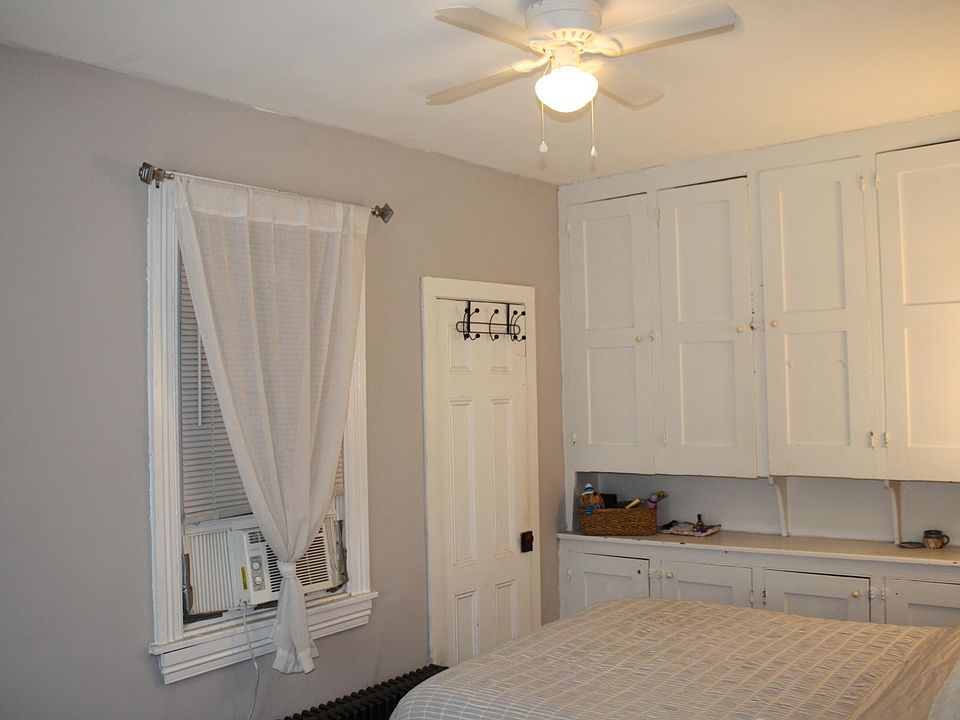 Bedroom 2, walk in closet, cabinet storage