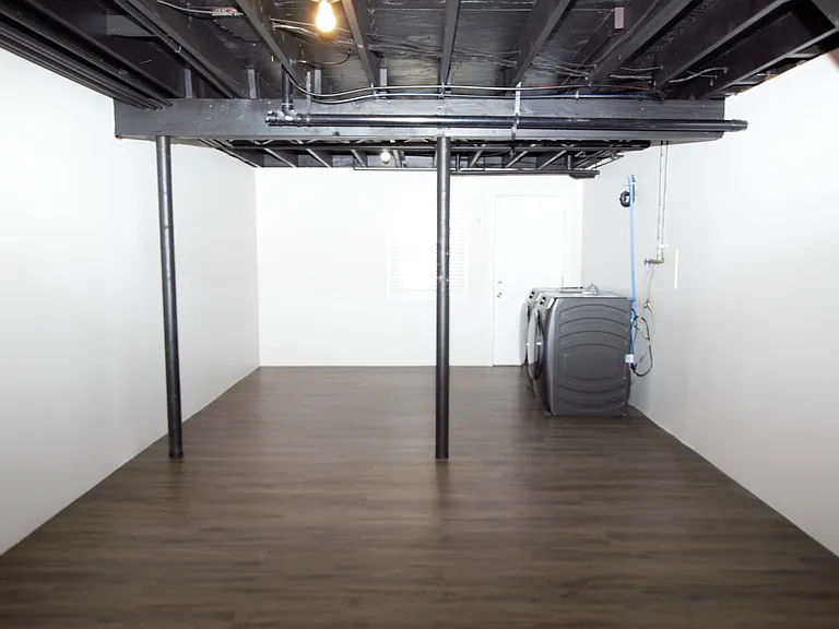 Partially finished basement space with laundry!