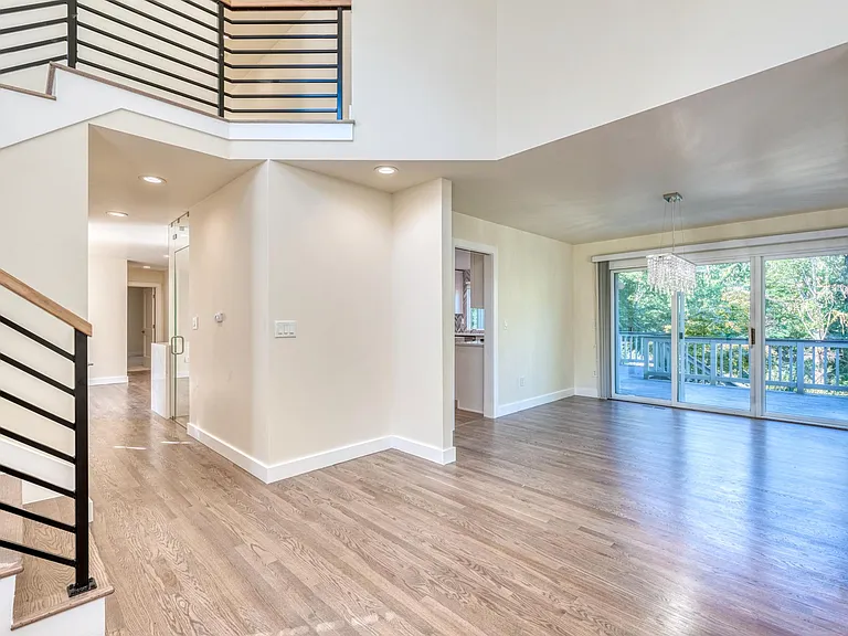 View from the entry into the dining area, stairs and hallway
