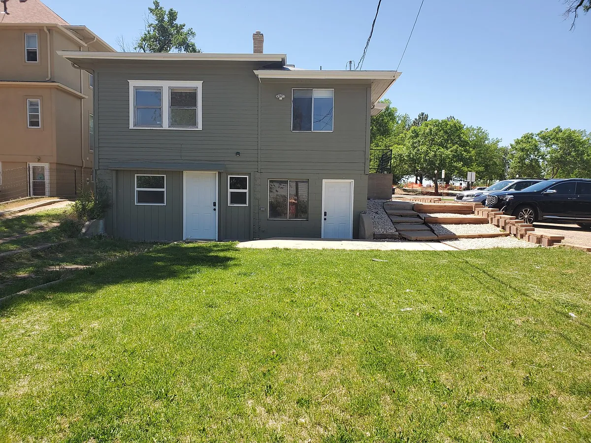 Basement apartment entry on left. Laundry Room on right. Yard space off of back and front. Pull through driveway. - 2014 10th Ave #BASEMENT