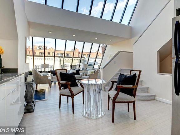 The Apartment is Flooded with Light from the Two Floors of G