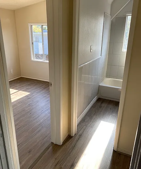 Hall leading to bedroom 2 and bathroom.