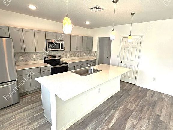 4th image of 1384 Axel Cir