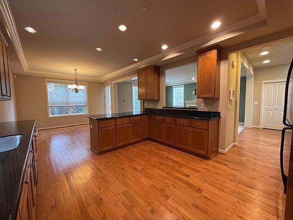 open concept of kitchen, dining, family/living room