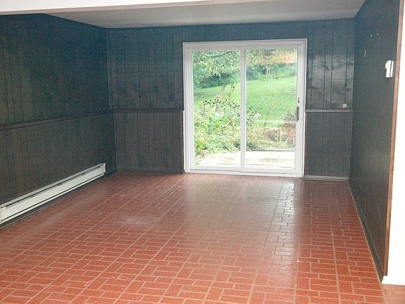 Family Room on ground level with walk out to patio