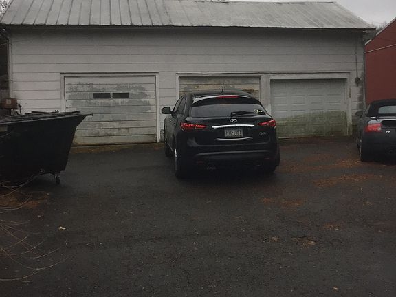 3 Car Garage w/wood shop