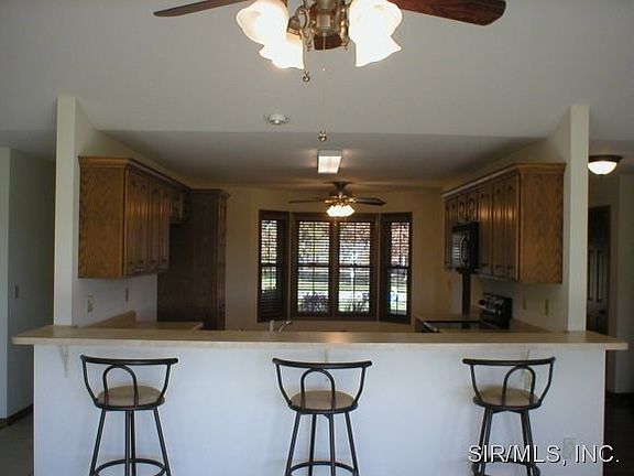 snack bar opens to kitchen