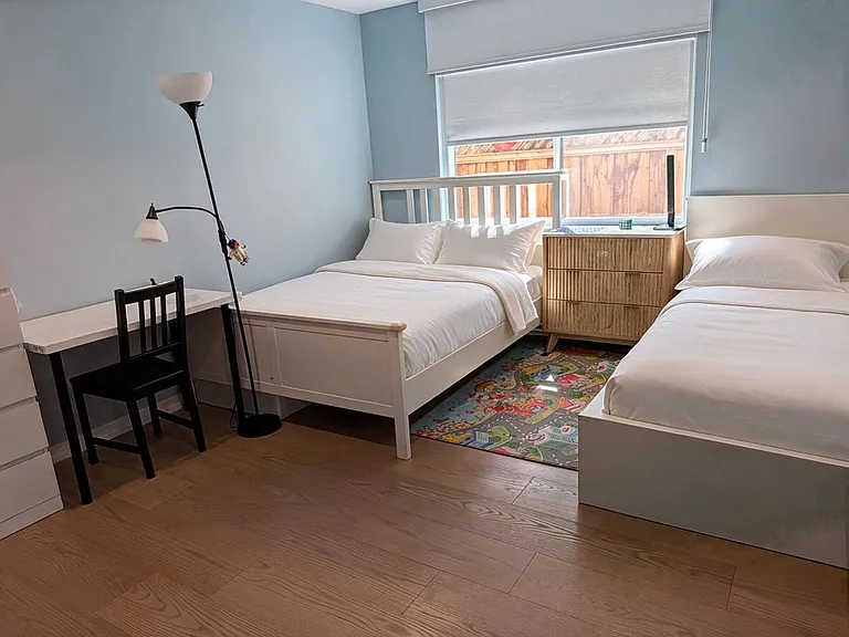 spacious bedroom enough for 2 queen beds