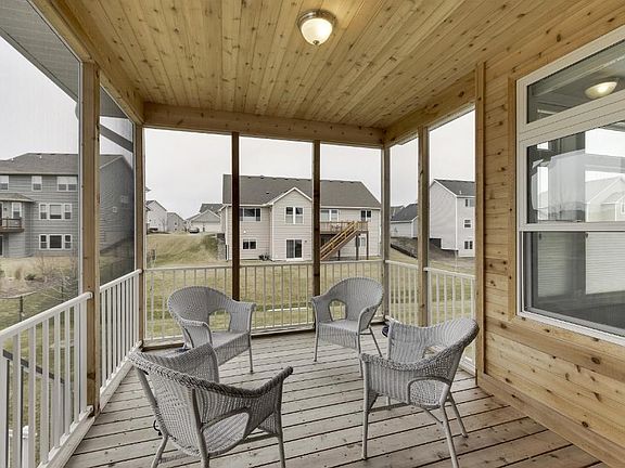 Screened-in porch with cedar ceiling