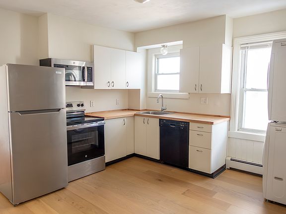 Newly renovated kitchen brand new cabinets, appliances (dishwasher, in-unit washer and dryer), hardwood floors.