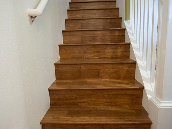 Bamboo flooring leads to upstairs