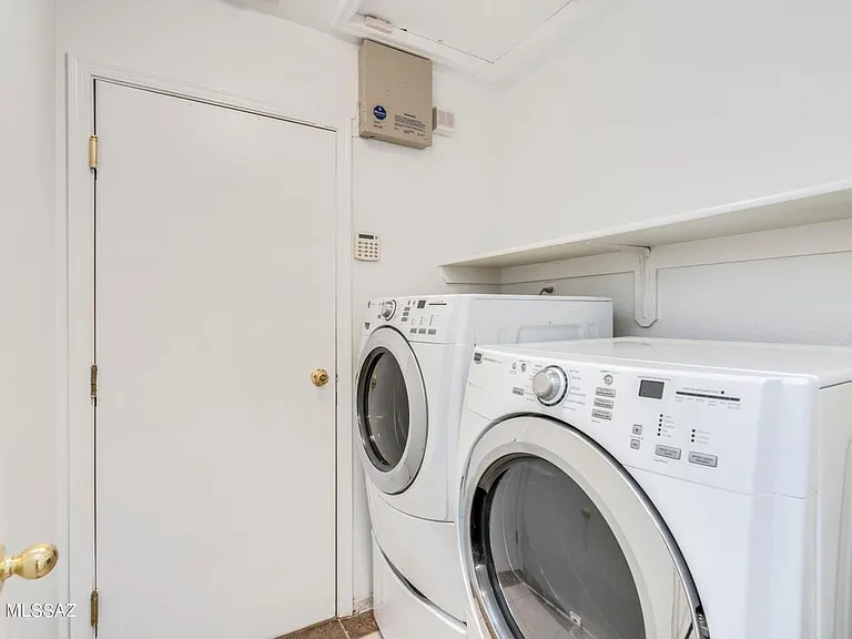 Laundry room with washer and dryer