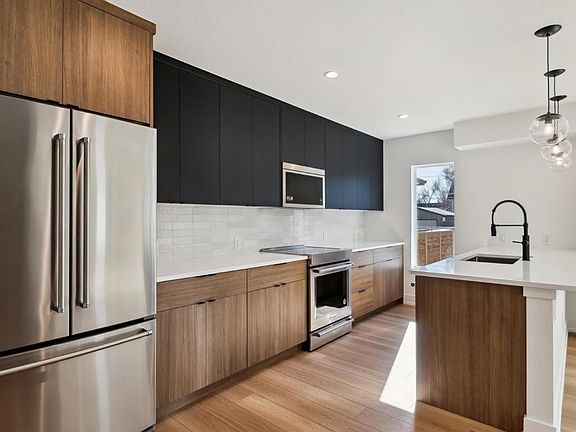 Quartz Countertop with KitchenAid Appliances
