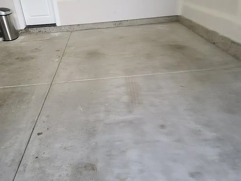 Spacious 2 car garage with enough space for storage.